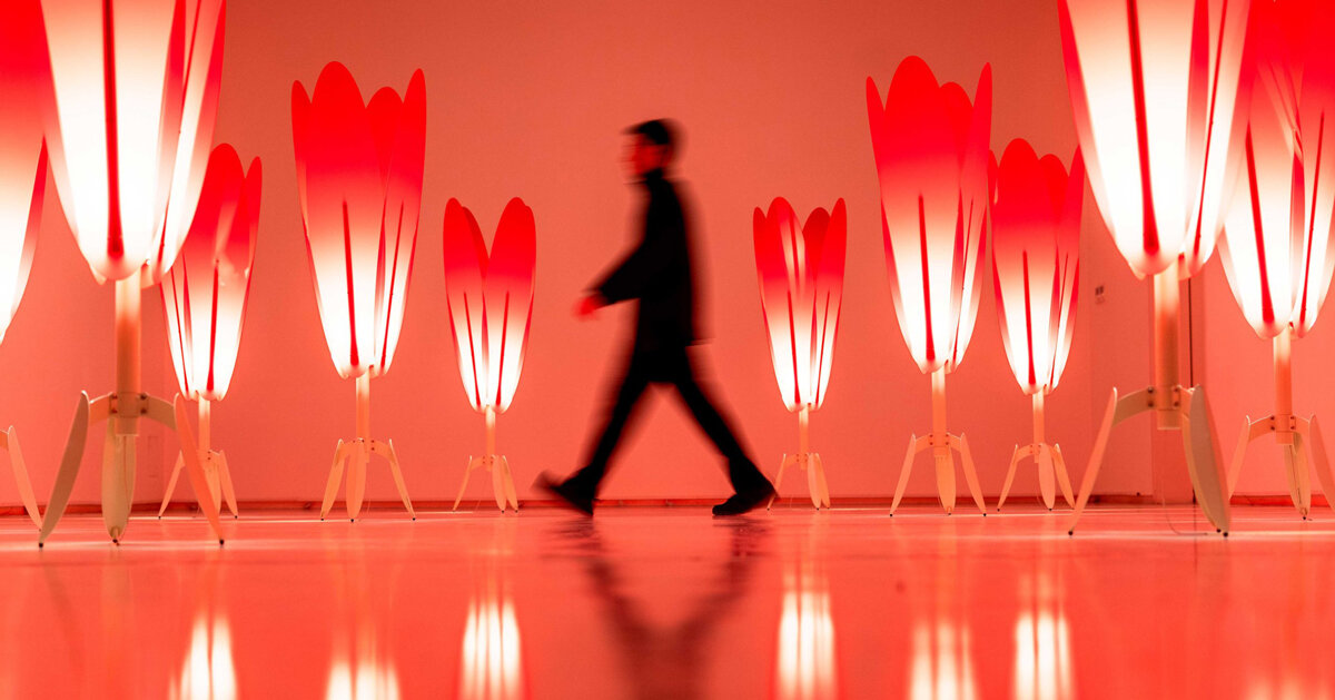 translucent red acrylic tulips form a glowing participatory light and sound installation 图片 1